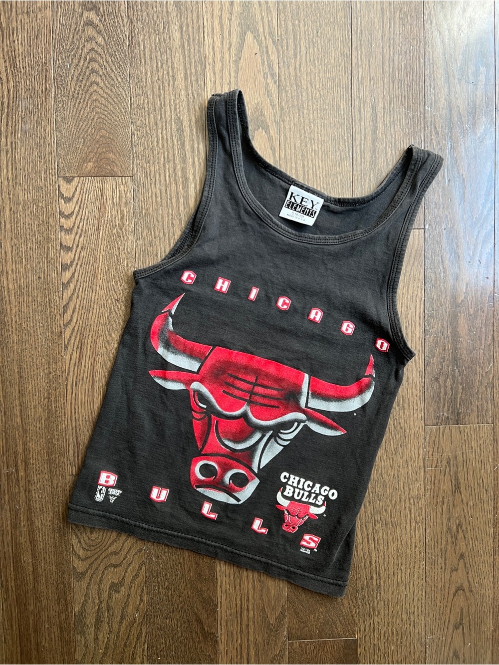 Vintage 1990s Chicago Bulls Kids Black Graphic Tank Top size small
